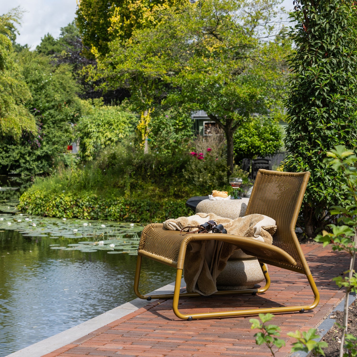 Woood West Tuin Loungestoel Honinggeel - KwaliteitWonen.nl